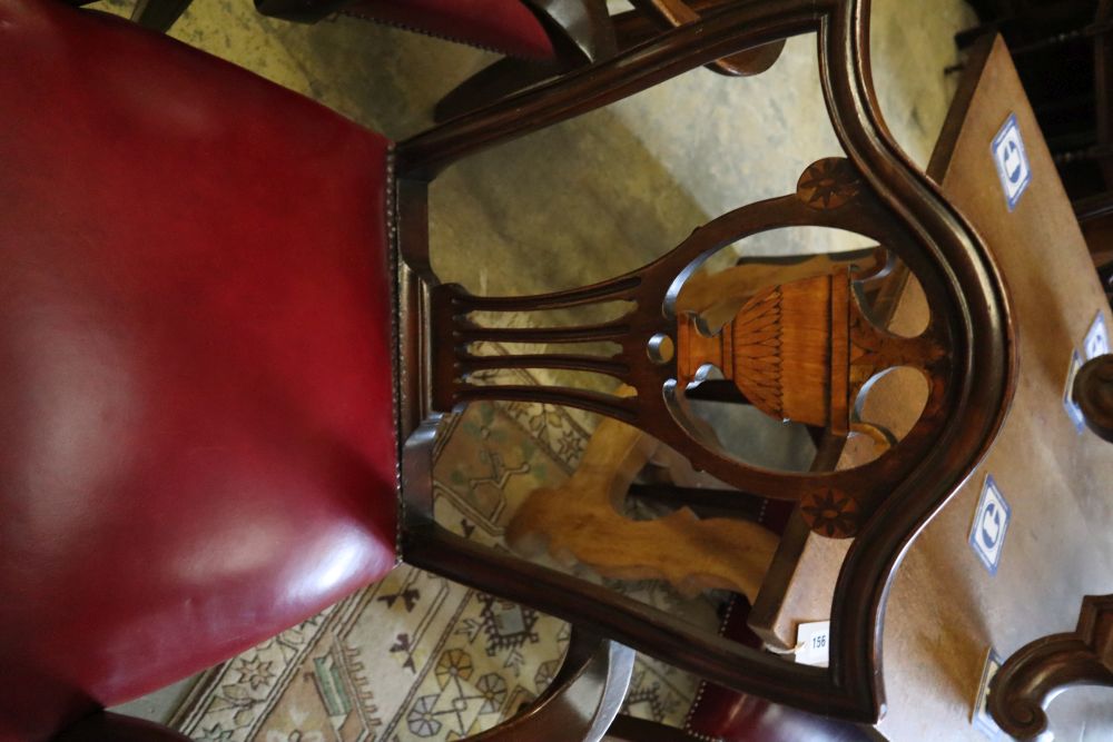 A set of eight George III inlaid mahogany dining chairs (2 with arms)